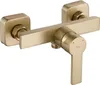 A gold-colored shower faucet is shown against a white background. Produktbild-Vorschau