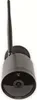 A black security camera with an antenna is mounted on a wall. Podgląd zdjęcia produktu
