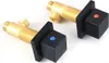 Two brass faucet valves with black square bases and colored buttons (blue and red) are displayed against a white background. Produktbild-Vorschau