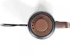 A top-down view of a black electric kettle with a wooden lid and handle, set against a white background. Anteprima dell’immagine prodotto
