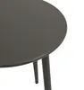 A close-up view of a round, dark gray metal table with three legs. Produktbild-Vorschau