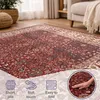 A close-up, angled view of a vintage oriental rug with a hand touching it, and icons describing its features. Produktbild-Vorschau