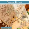 Close-up of a white lace curtain with tassels, showing intricate patterns and a measurement indicator. Anteprima dell’immagine prodotto
