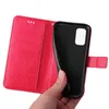 A hand holding a red flip phone case with a floral pattern. Produktbild-Vorschau