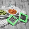 A kitchen scene with chopped vegetables and a vegetable chopper. Produktbild-Vorschau
