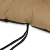 A close-up view of a beige cushion with black ties. Produktbild-Vorschau