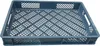 A gray plastic crate with a grid pattern on the bottom and sides, shown from a slightly elevated angle against a white background. Produktbild-Vorschau