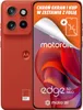 A red Motorola smartphone with a promotional overlay on the screen. Produktbild-Vorschau