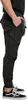 A person wearing black cargo pants and black sneakers. Produktbild-Vorschau