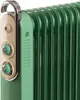 Close-up of a green oil-filled radiator with cream and silver controls. Voir les images du produit