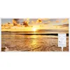 A digital panel displaying a beach sunset scene with a digital display showing temperature. Produktbild-Vorschau