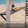 A bar stand on a beach with a bottle of champagne and fruit. Produktbild-Vorschau