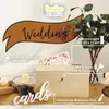 A wooden box for wedding cards, decorated with a banner and eucalyptus. Produktbild-Vorschau