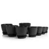 A set of black plant pots with saucers arranged on a white background. Produktbild-Vorschau
