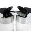 Close-up view of the tops of two spice jars. Produktbild-Vorschau