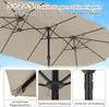 A collage of images showing a large beige double patio umbrella and close-ups of its features. Náhled obrázku produktu