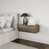A bedroom scene with a bed, a floating nightstand, and a lamp. Produktbild-Vorschau
