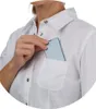 A person's hand is placing a small, light blue, rectangular object into the chest pocket of a white button-down shirt. Anteprima dell’immagine prodotto