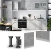 A collage of kitchen elements including cabinets, an oven, a sink, and cabinet legs and panels. Náhled obrázku produktu