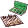A wooden chess set with pieces in a box and pieces on a board. Anteprima dell’immagine prodotto