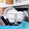 A dishwasher rack filled with clean white plates and cups. Náhled obrázku produktu