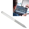 A stylus pen is shown in the foreground, with a blurred background showing two people looking at a tablet displaying charts and graphs. Voir les images du produit