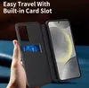 A hand holding a black flip case for a smartphone, with a card inserted into a slot on the case. Náhled obrázku produktu