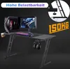 A gaming desk setup with a computer, monitor, keyboard, and headphones, along with marketing text and graphics. Produktbild-Vorschau