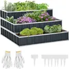 A tiered raised garden bed filled with various plants, including herbs, flowers, and vegetables. Gardening gloves and plant markers are shown in the foreground. Podgląd zdjęcia produktu