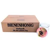 A cardboard box with text and a glass jar with a lid featuring a bee design. Podgląd zdjęcia produktu