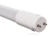 A close-up shot of the end of a white LED tube light with two silver pins. Anteprima dell’immagine prodotto