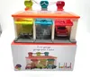 A toy car garage set on its packaging box. Voir les images du produit