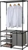 A black metal garment rack with shelves and a laundry hamper, holding white shirts and shoes. Produktbild-Vorschau