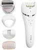 A white Philips epilator with several attachments displayed to the left of the main device. Anteprima dell’immagine prodotto