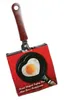 A heart-shaped frying pan with an egg inside, presented on its packaging. Náhľad obrázku produktu