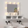 A white vanity mirror with LED lights and a shelf above two sinks with black faucets. Náhľad obrázku produktu