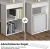 A split image showing a white desk with shelves on the left and a computer tower in the right section, demonstrating the removability of a shelf to create space. Text below explains the feature. Podgląd zdjęcia produktu