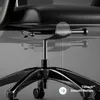 Close-up view of the base and tilt mechanism of a black office chair. Náhled obrázku produktu