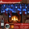 A festive Christmas decoration featuring blue snowflake string lights and red stockings hanging over a fireplace. Anteprima dell’immagine prodotto