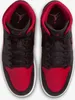 A top-down view of a pair of Nike Air Jordan 1 Mid sneakers in a black and red colorway. Náhled obrázku produktu