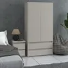 A bedroom scene with a wardrobe, nightstand, and bed. Produktbild-Vorschau