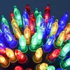A close-up view of a string of colorful LED lights. Produktbild-Vorschau