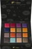 A box of assorted chocolates with a black patterned background. Produktbild-Vorschau