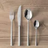 A set of four Villeroy & Boch cutlery pieces arranged on a wooden surface. Náhled obrázku produktu