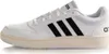 A side view of a white Adidas sneaker with black stripes. Anteprima dell’immagine prodotto