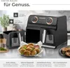 A black air fryer is shown on a kitchen counter with a basket of food in front of it and a plate of food to the side. Text overlays describe features. Produktbild-Vorschau
