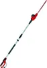 A red and silver electric pole hedge trimmer is shown against a white background. Náhled obrázku produktu