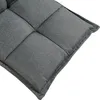 Close-up view of a gray tufted floor cushion. Voir les images du produit