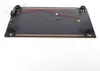 A flat, dark gray rectangular board with four black and silver feet, wires, and a small green component. Náhled obrázku produktu
