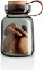 A glass jar filled with cookies, with a wooden lid and a leather strap. Náhled obrázku produktu